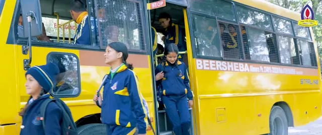 Students stepping off the Beersheba school bus