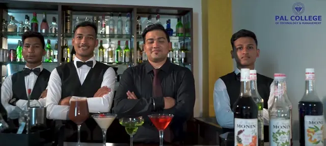 Hospitality students behind the college bar